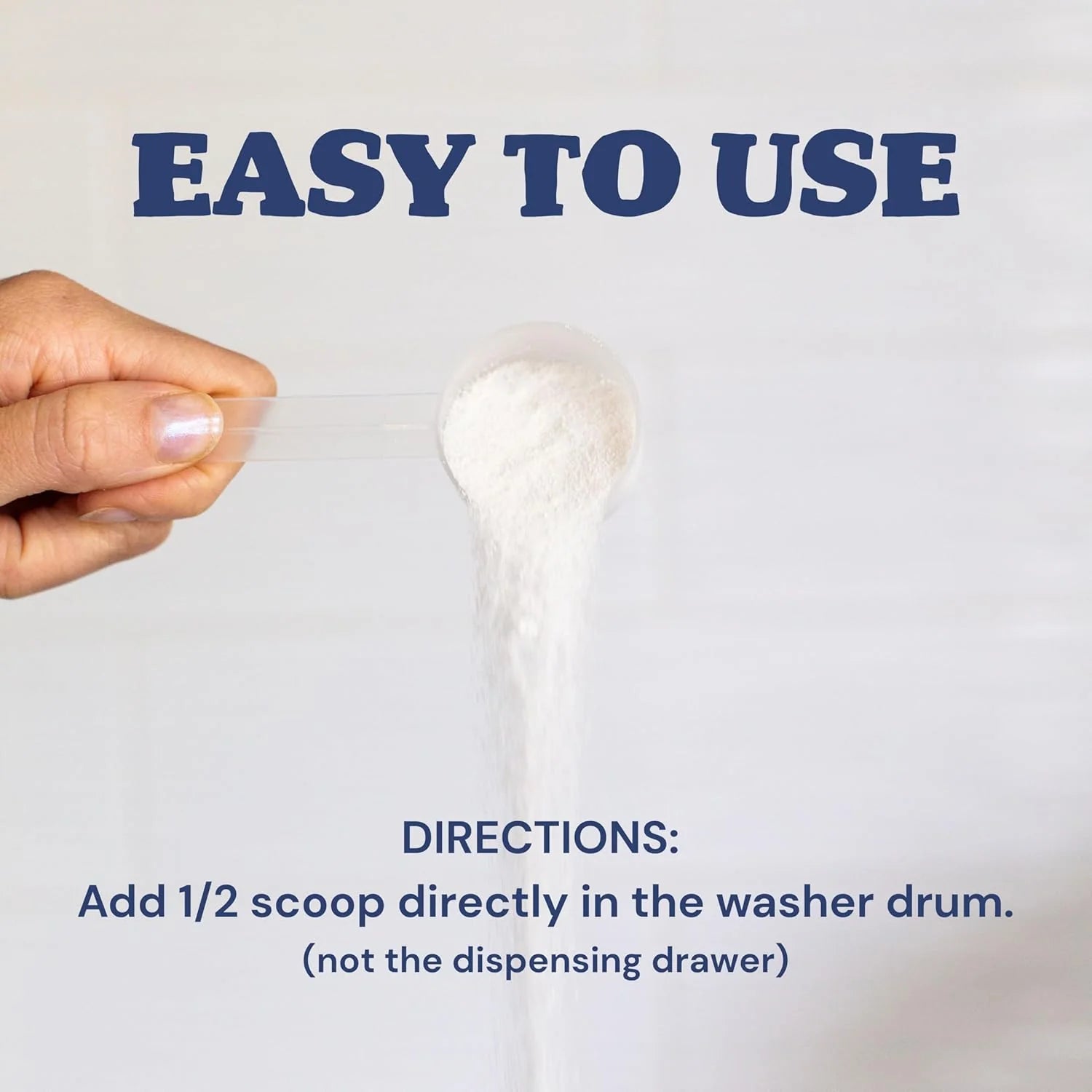 Hand pouring a half scoop of white powder with text "Easy to Use" above. Instructions read: Add 1/2 scoop directly in washer drum, not dispensing drawer.