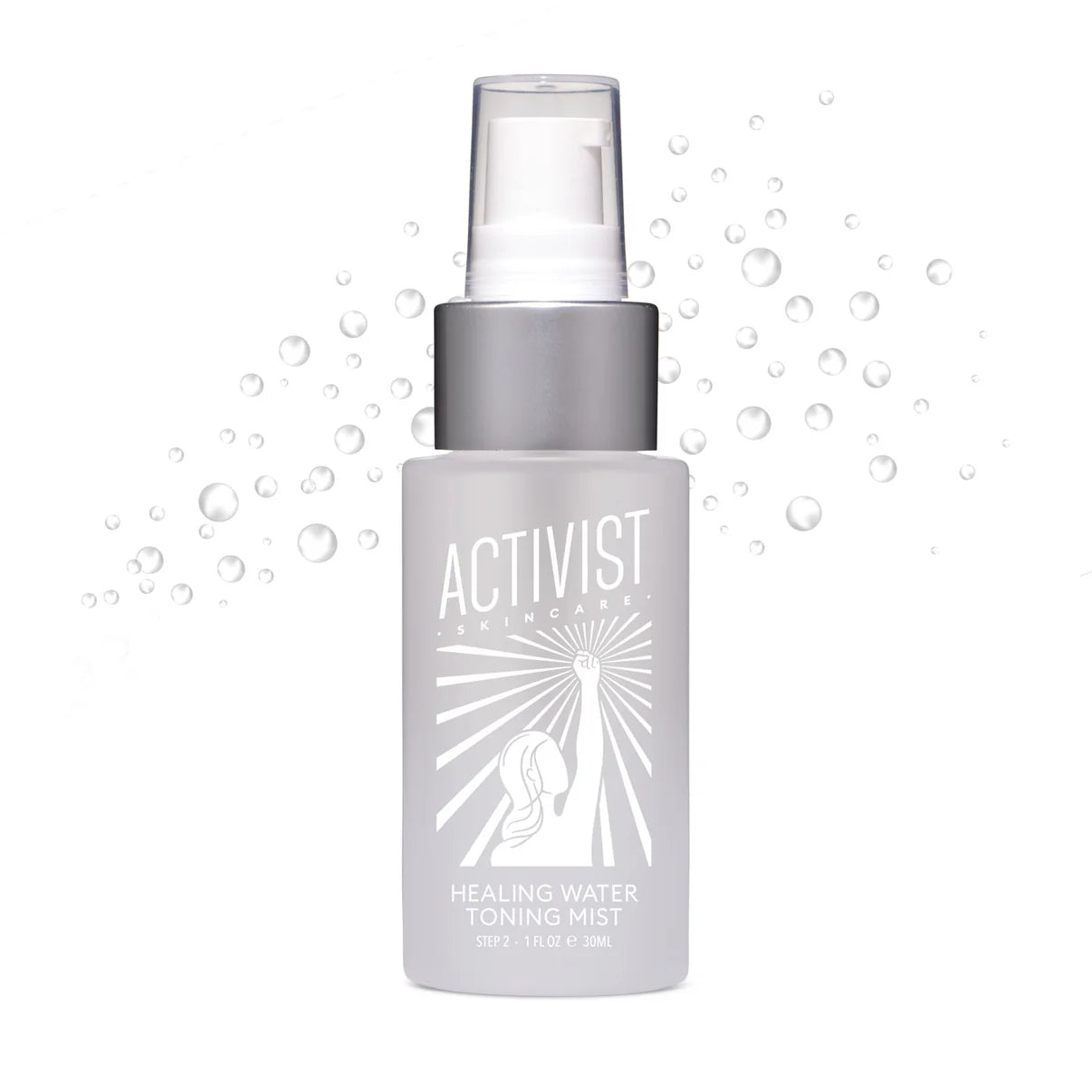 A white spray bottle labeled 'ACTIVIST Healing Water Toning Mist' with a graphic of a sun and moon and the text 'toning mist'.