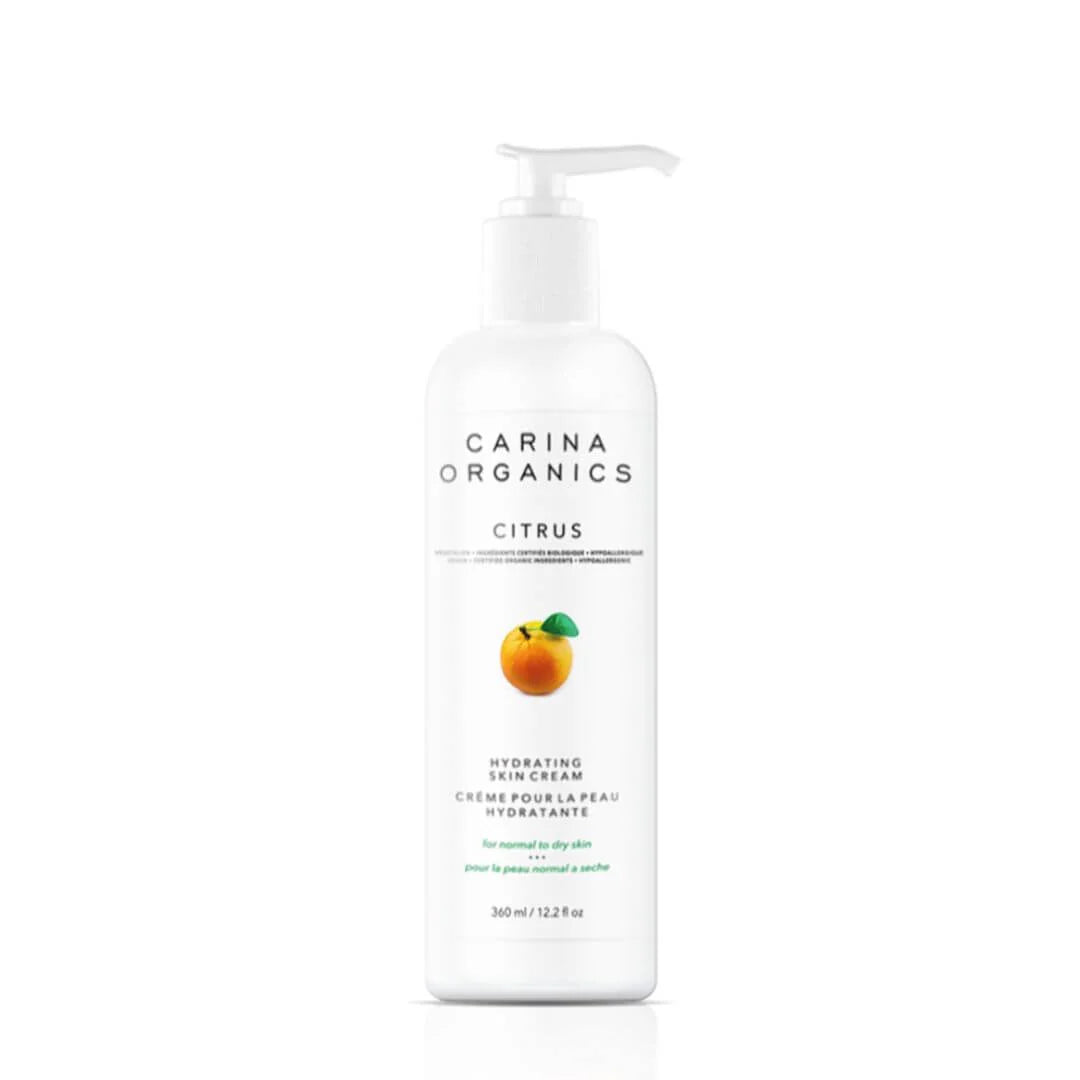 White bottle of Carina Organics Citrus Hydrating Skin Cream with pump. Features a small orange and green leaf image. For normal to oily skin.