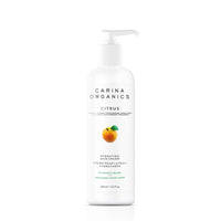 White bottle of Carina Organics Citrus Hydrating Skin Cream with pump. Features a small orange and green leaf image. For normal to oily skin.