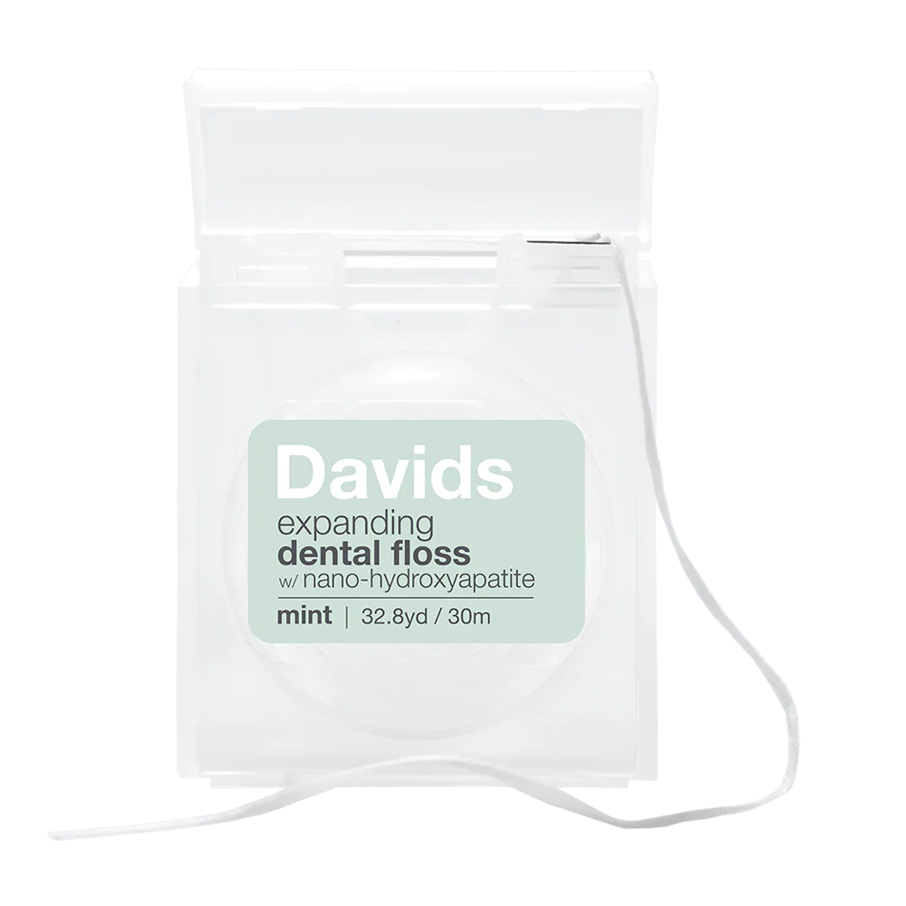 Davids expanding dental floss packaging on a white background