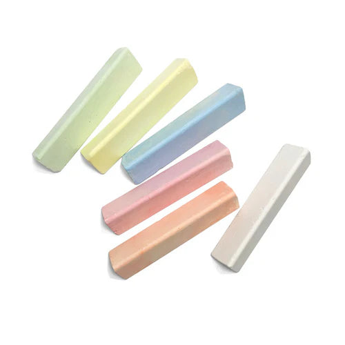 Set of pastel-colored chalk sticks on a white background