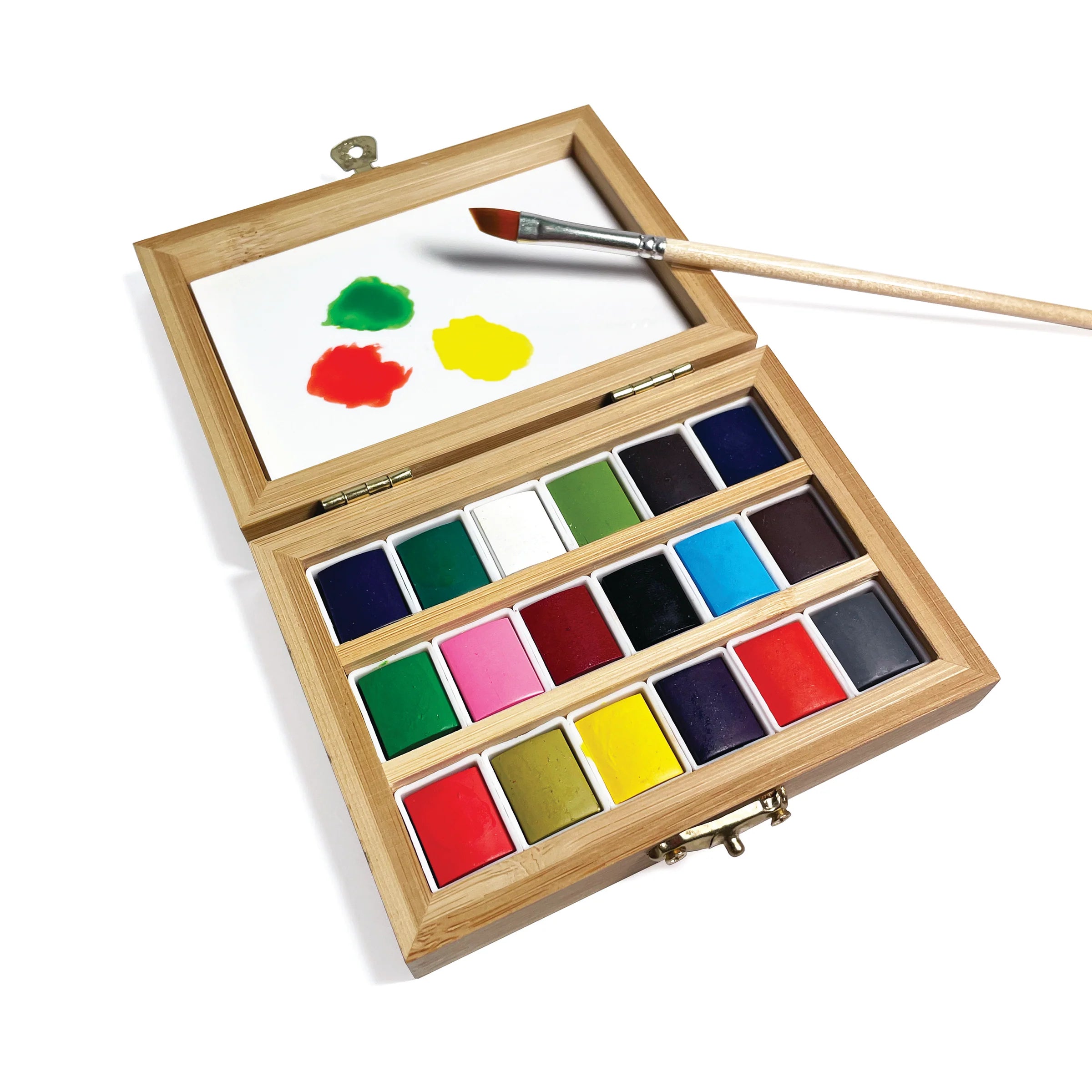 Wooden watercolor paint set with paintbrush on a white background