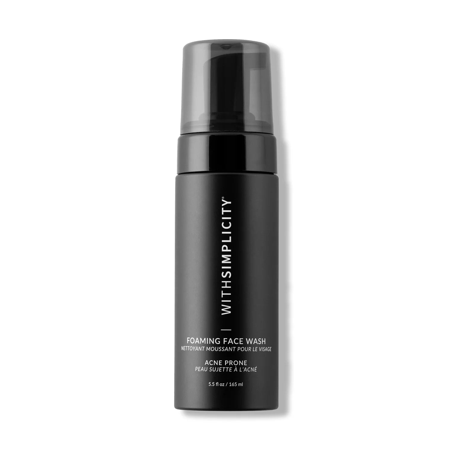 Black bottle of 'WITHSIMPLICITY' foaming face wash on a white background