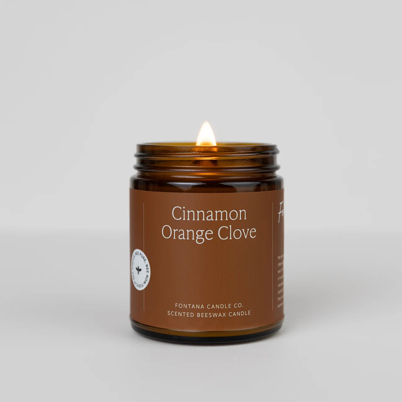 Cinnamon Orange Clove candle from different angle.