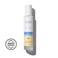A bottle of Good Karma Dry Oil Mineral Sunscreen, SPF 30 with a white pump, labeled with the brand SOLARA and the product name.
