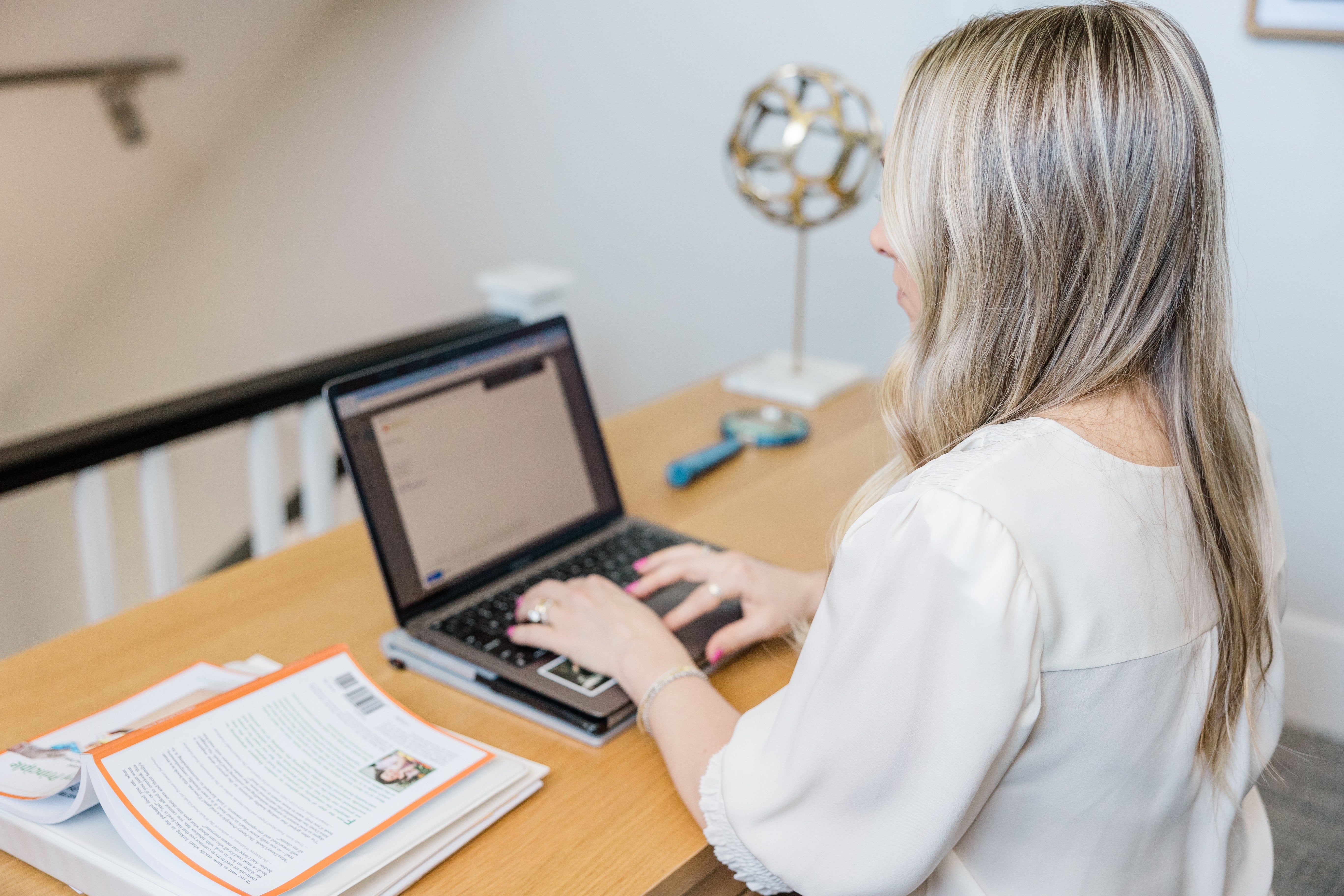 Women using laptop.