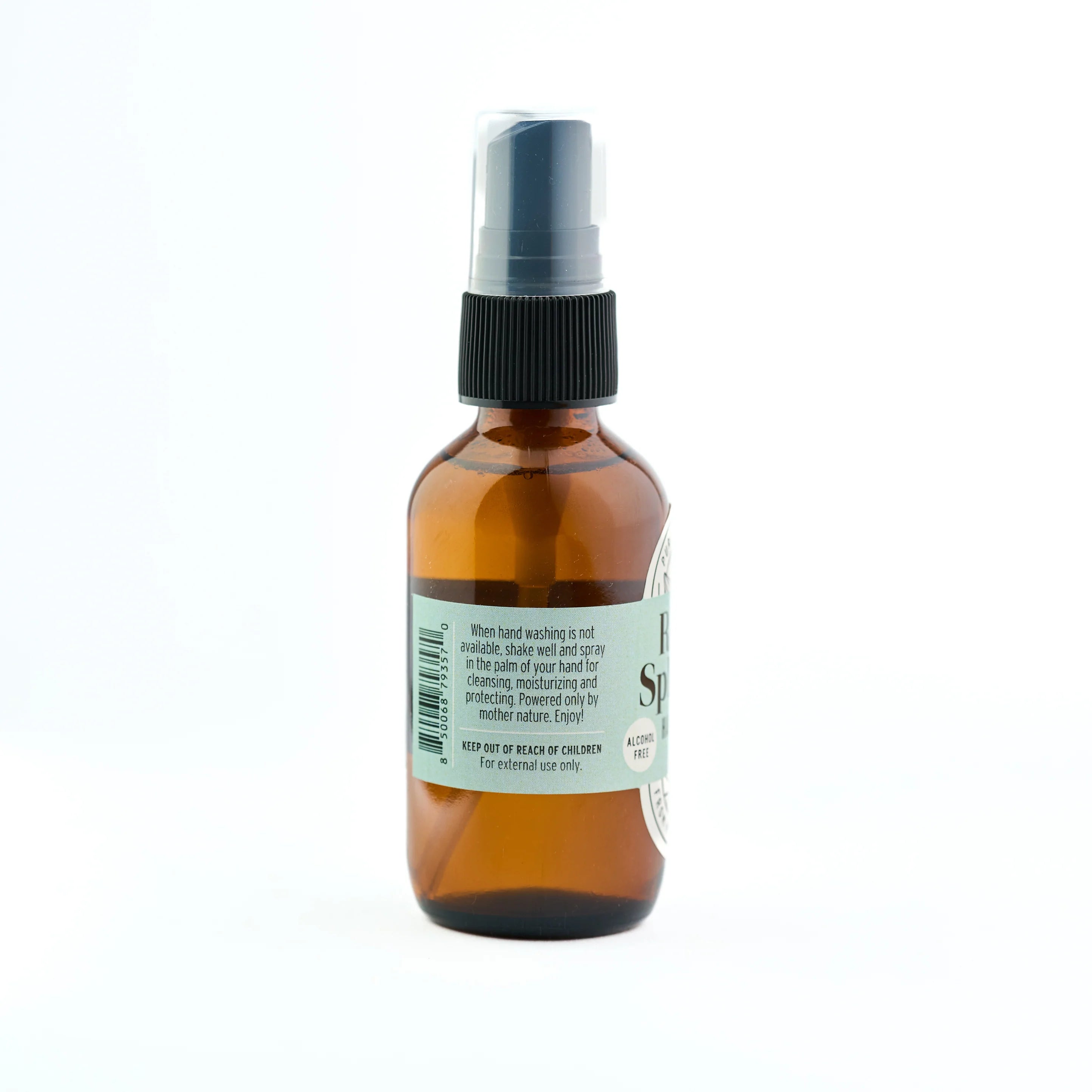 Brown spray bottle with a label on a white background