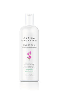 Carina Organics Sweet Pea conditioner bottle on a white background