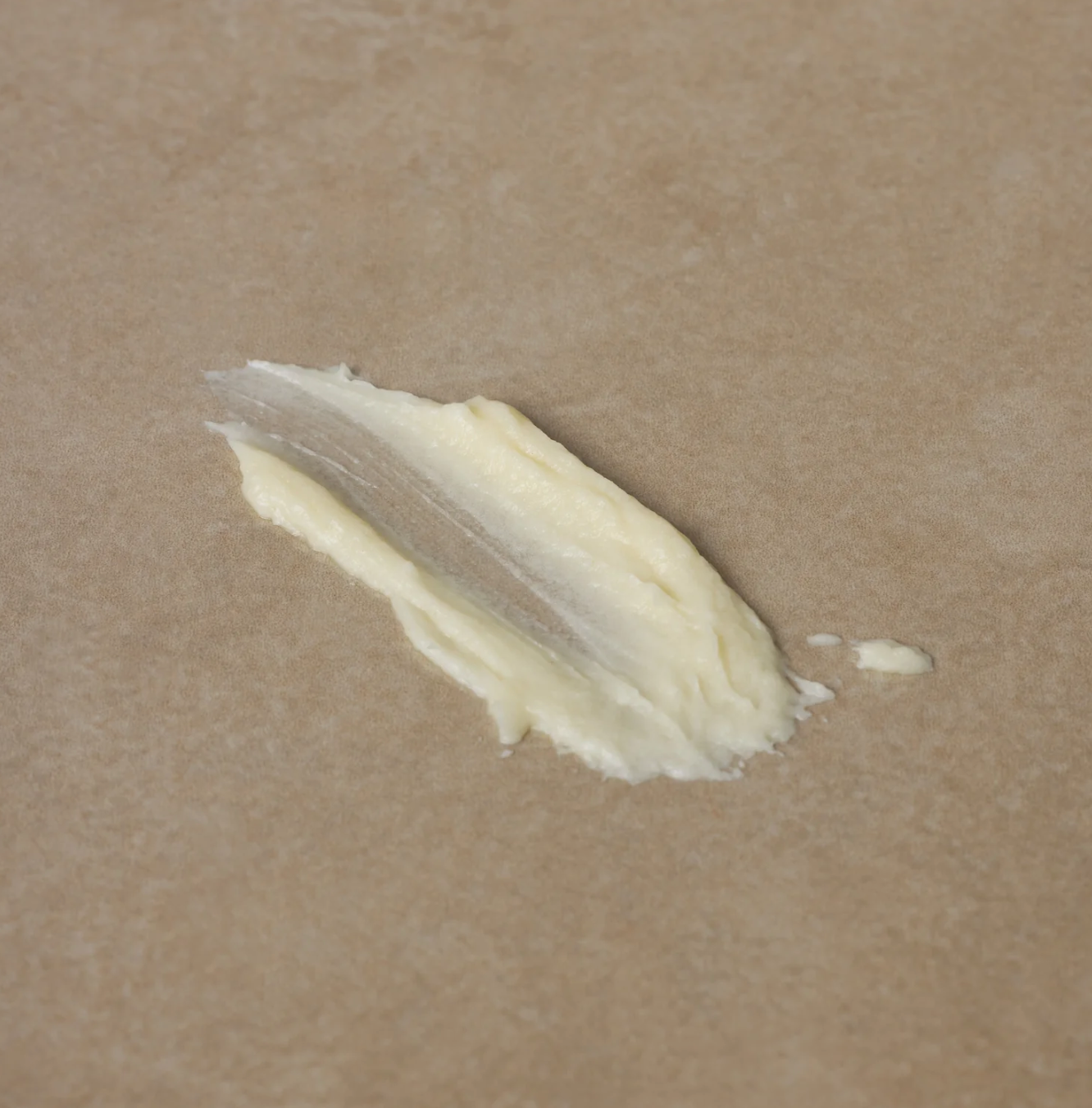Cream on skin.