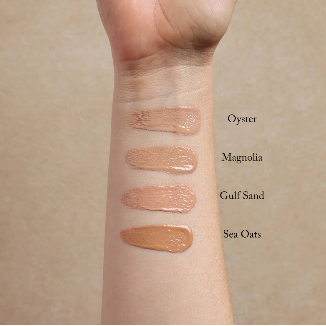 Swatches of different beige shades on a wrist with labels 'Oyster', 'Magnolia', 'Gulf Sand', and 'Sea Oats'.