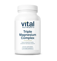 Supplement bottle labeled 'Triple Magnesium Complex' by Vital Nutrients on a white background