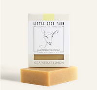 Bar of soap with 'Little Seed Farm' packaging on a white background