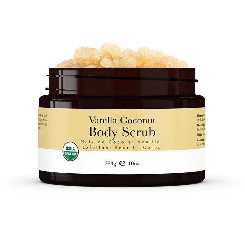 A jar of Vanilla Coconut Body Scrub with the lid open, showing granular product inside. The label on the jar indicates it is organic and has a net weight of 225g.