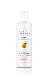 Carina Organics Citrus shampoo bottle on a white background
