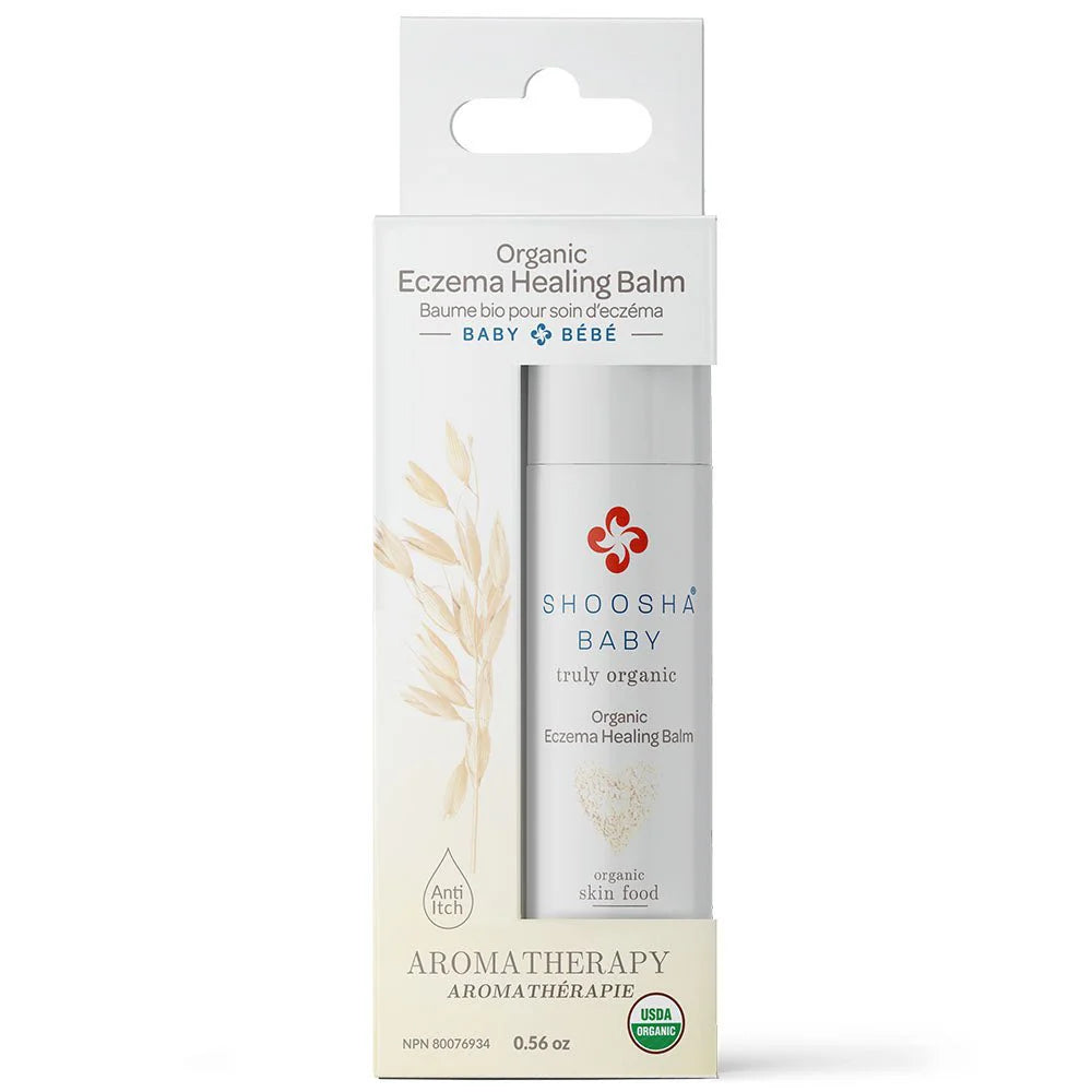 Packaging of Shoosha Baby Organic Eczema Healing Balm in off-white box with floral design. Contains 0.56 oz balm; features organic and USDA-certified labels.