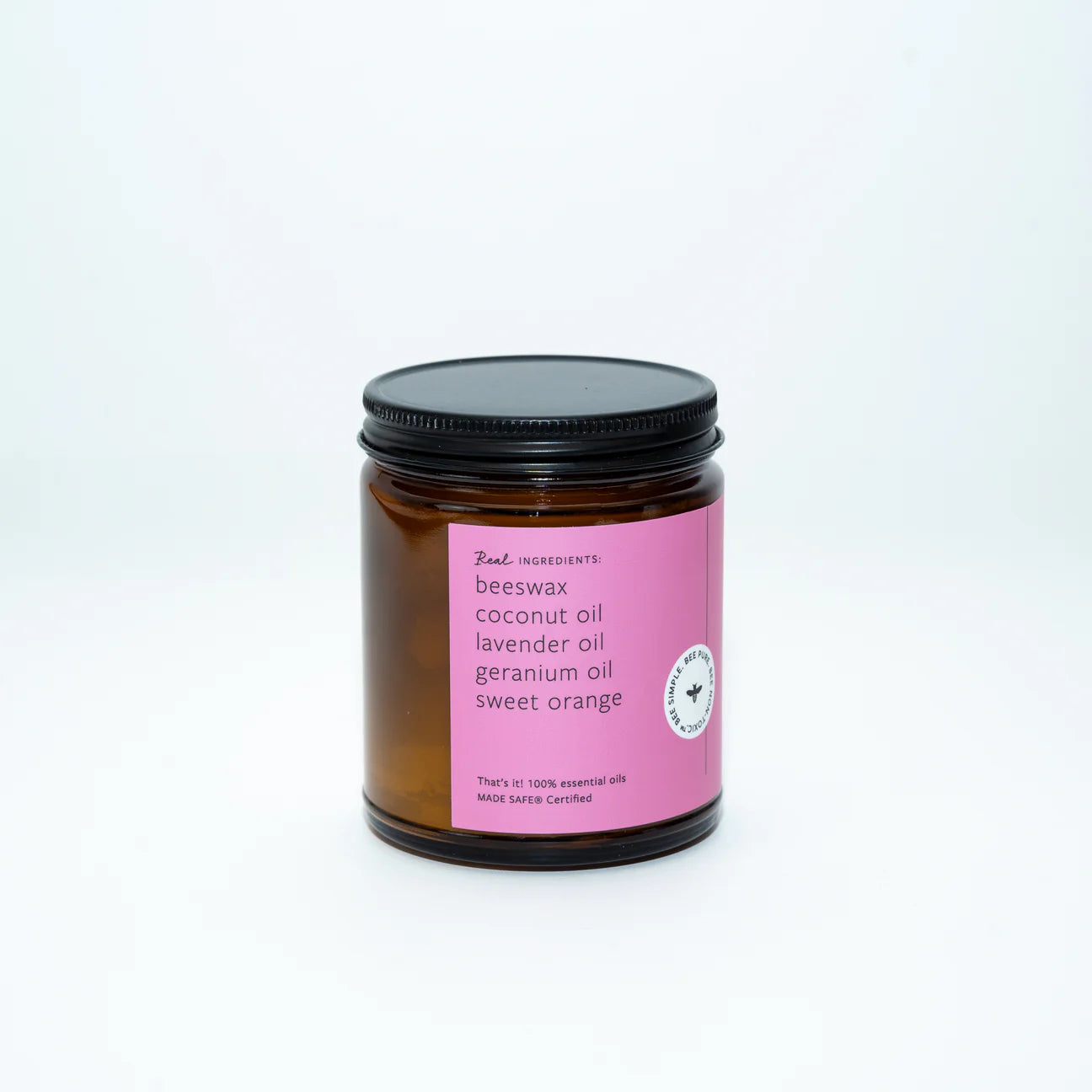 beeswax many oil Candle jar with pink label on white background