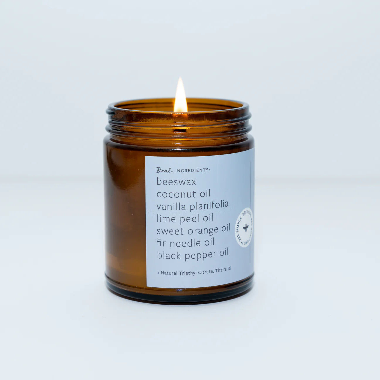 beeswax coconut oil Candle in a brown jar with a label on a white background