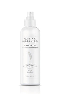 Carina Organics unscented fast-drying hairspray bottle on a white background