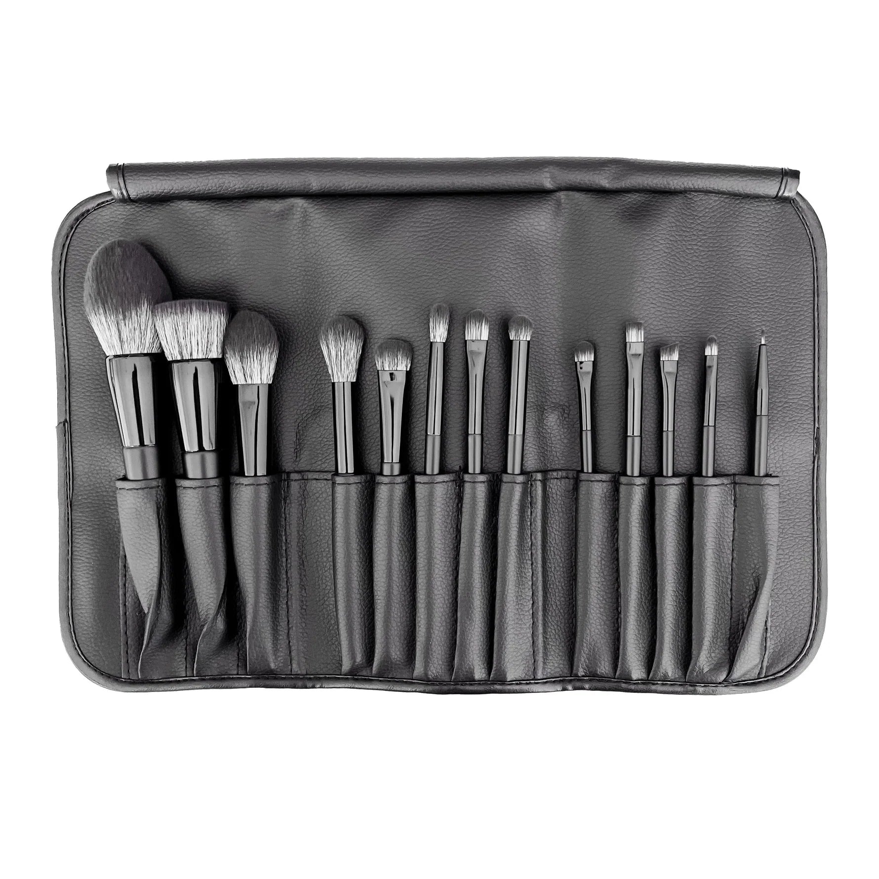 Set of makeup brushes in a black case on a white background