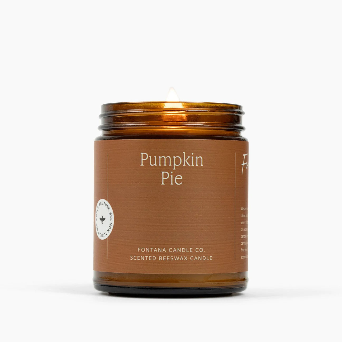 Candle with 'Pumpkin Pie' fragrance on a white background